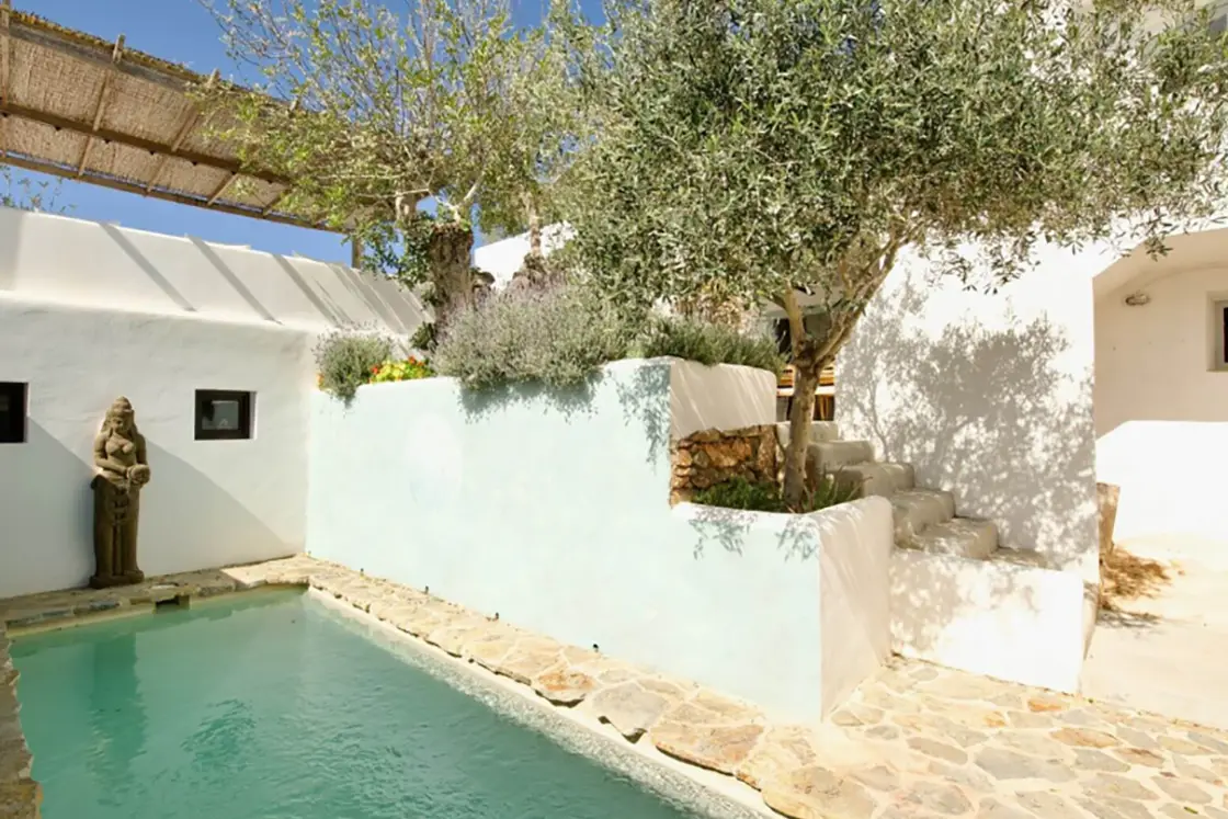 Perfect Hideaways real estate property: A sparkling swimming pool in the outdoor terrace, situated between the various sections of this sprawling Finca home. Ibiza, Ibizan Finca.