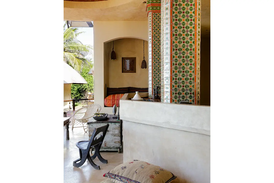 Perfect Hideaways real estate property: A living area, featuring alcove seating, as well as Moroccan decor and tiled pillars. Villa Tanga, Benguerra Island.