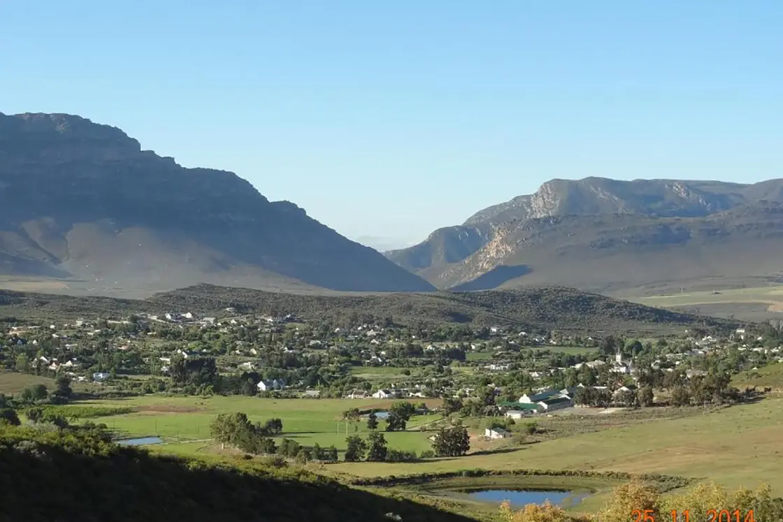 Perfect Hideaways real estate property: Landscape view of the Barrydale town and nearby farmland located in the Western Cape of South Africa. The White House in Barrydale.