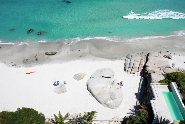 Perfect Hideaways property for sale: An aerial photograph of Clifton 2nd Beach on a sunny day. The sea is calm and the water is clear, the white sand brightly reflects light from the sun. San Michelle, Clifton.